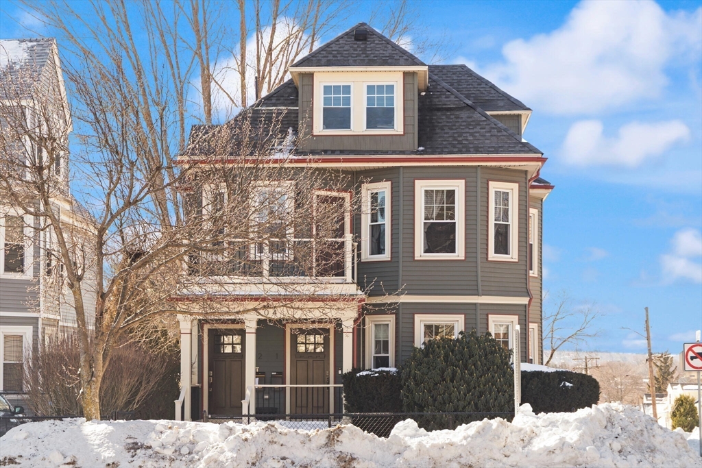 504 Main Street, Unit 1 Watertown, MA 02472 - Photo 34 of 35 a front view of a building with a yard