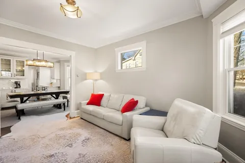 a living room with furniture and a couch