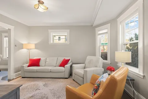 a living room with furniture and a couch