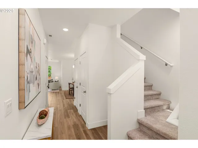 a view of entryway with wooden floor
