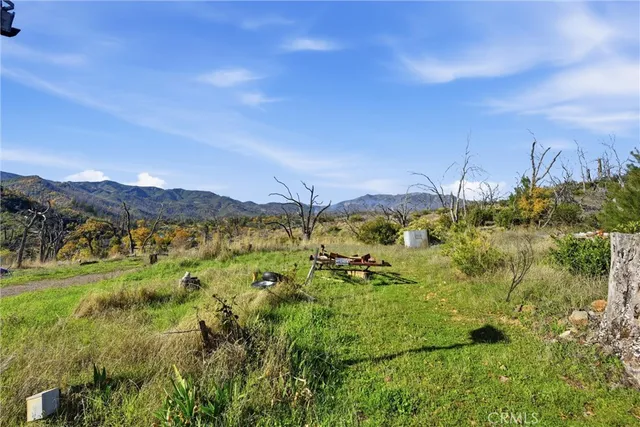 a view of a lake with mountains in the background