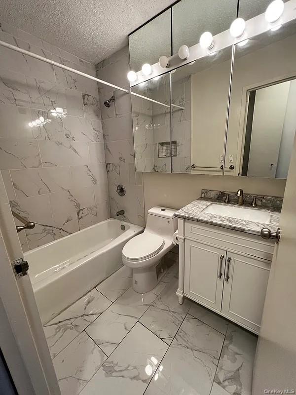 62-54 97th Place, Unit 4G Queens, NY 11374 - Photo 6 of 13 a bathroom with a sink a toilet and shower