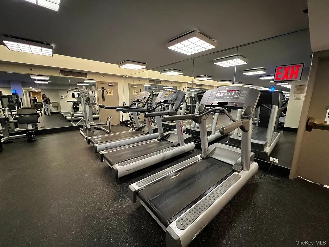 62-54 97th Place, Unit 4G Queens, NY 11374 - Photo 8 of 13 a view of a room with gym equipment