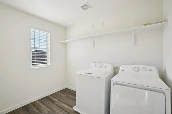 a utility room with dryer and washer