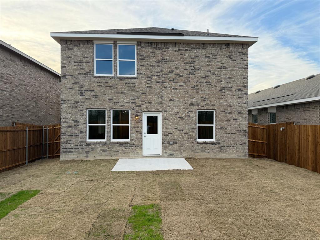 2104 Prairie Lane Melissa, TX 75454 - Photo 3 of 19 a front view of a house with a yard and garage