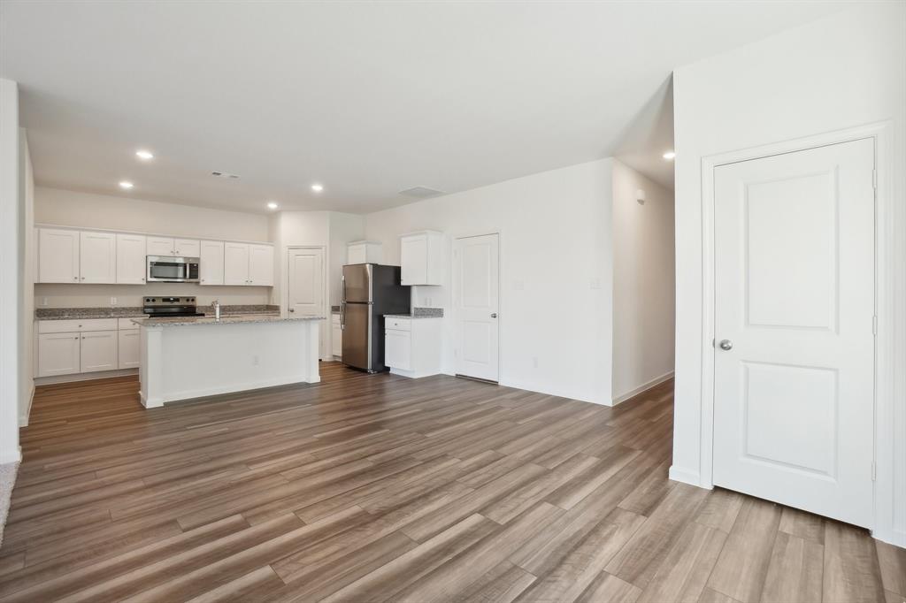 2104 Prairie Lane Melissa, TX 75454 - Photo 19 of 19 a view of kitchen with wooden floor