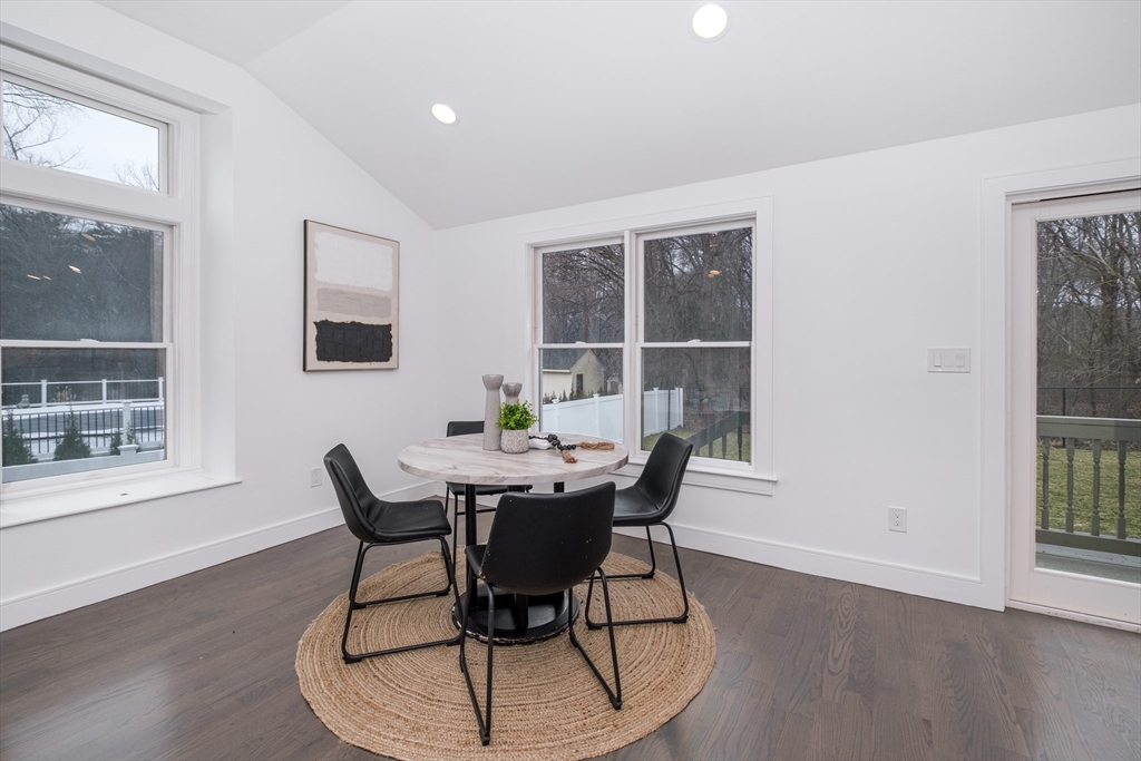 26 Harris Avenue Wellesley, MA 02481 - Photo 13 of 37 a view of a dining room with furniture and wooden floor