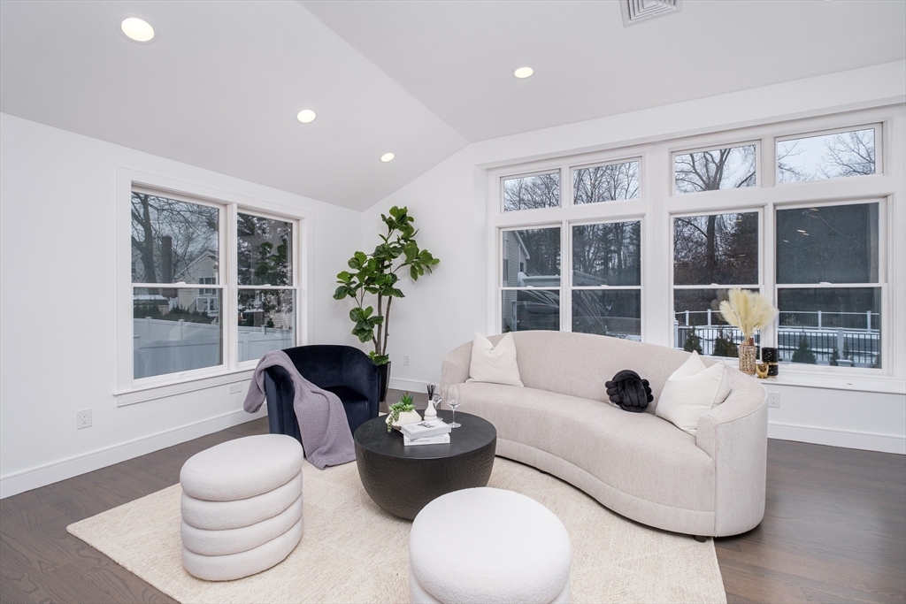 26 Harris Avenue Wellesley, MA 02481 - Photo 14 of 37 a living room with furniture and a large window