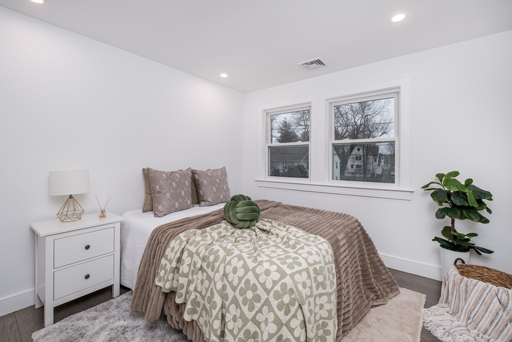 26 Harris Avenue Wellesley, MA 02481 - Photo 16 of 37 a bedroom with a bed and a window