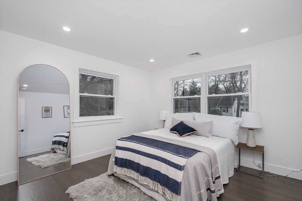 26 Harris Avenue Wellesley, MA 02481 - Photo 19 of 37 a bedroom with a bed and a window