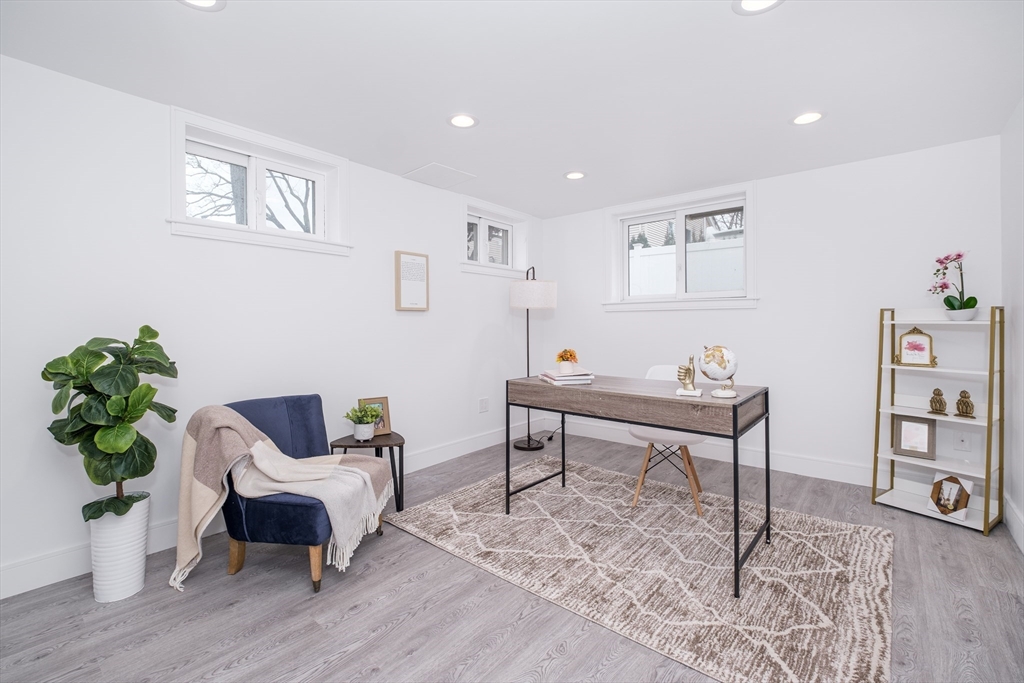 26 Harris Avenue Wellesley, MA 02481 - Photo 31 of 37 a view of a livingroom with furniture and wooden floor