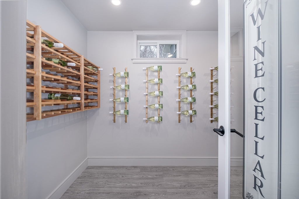 26 Harris Avenue Wellesley, MA 02481 - Photo 33 of 37 a view of livingroom with hardwood floor and hallway