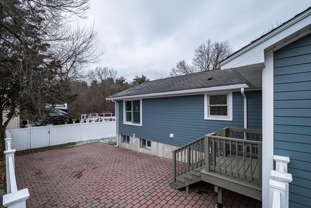 26 Harris Avenue Wellesley, MA 02481 - Photo 36 of 37 a view of backyard with a deck and wooden floor