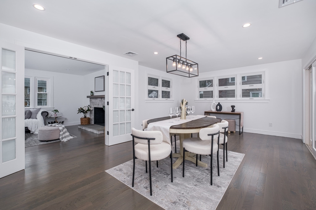 26 Harris Avenue Wellesley, MA 02481 - Photo 5 of 37 a view of a dining room with furniture window and wooden floor