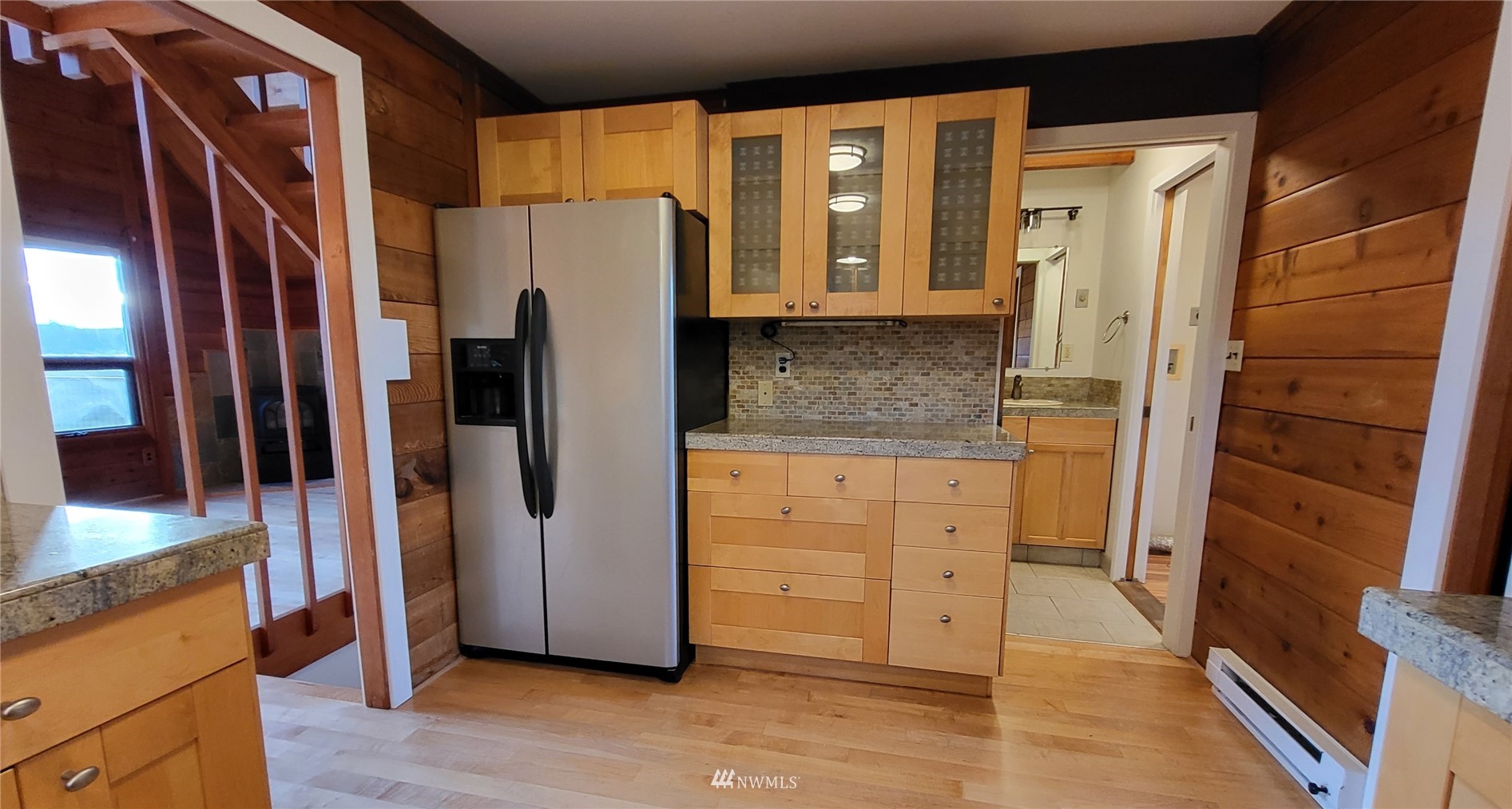 1040 Spath Road Sequim, WA 98382 - Photo 13 of 34 a kitchen with stainless steel appliances a refrigerator and a stove