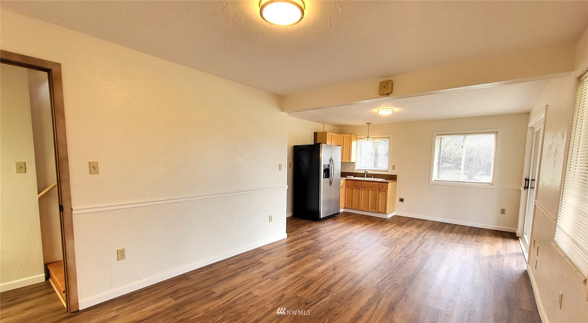 1040 Spath Road Sequim, WA 98382 - Photo 23 of 34 a view of empty room with wooden floor and window