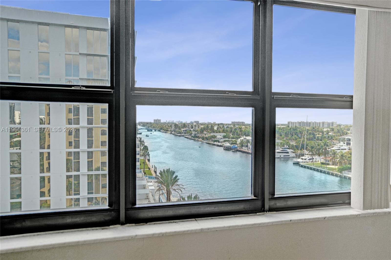 501 North Riverside Drive, Unit 802 Pompano Beach, FL 33062 - Photo 15 of 70 a view of a glass door with a from a window