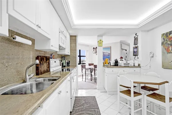 a spacious bedroom with a bed and a large window