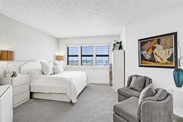 a spacious bathroom with a double vanity sink mirror and