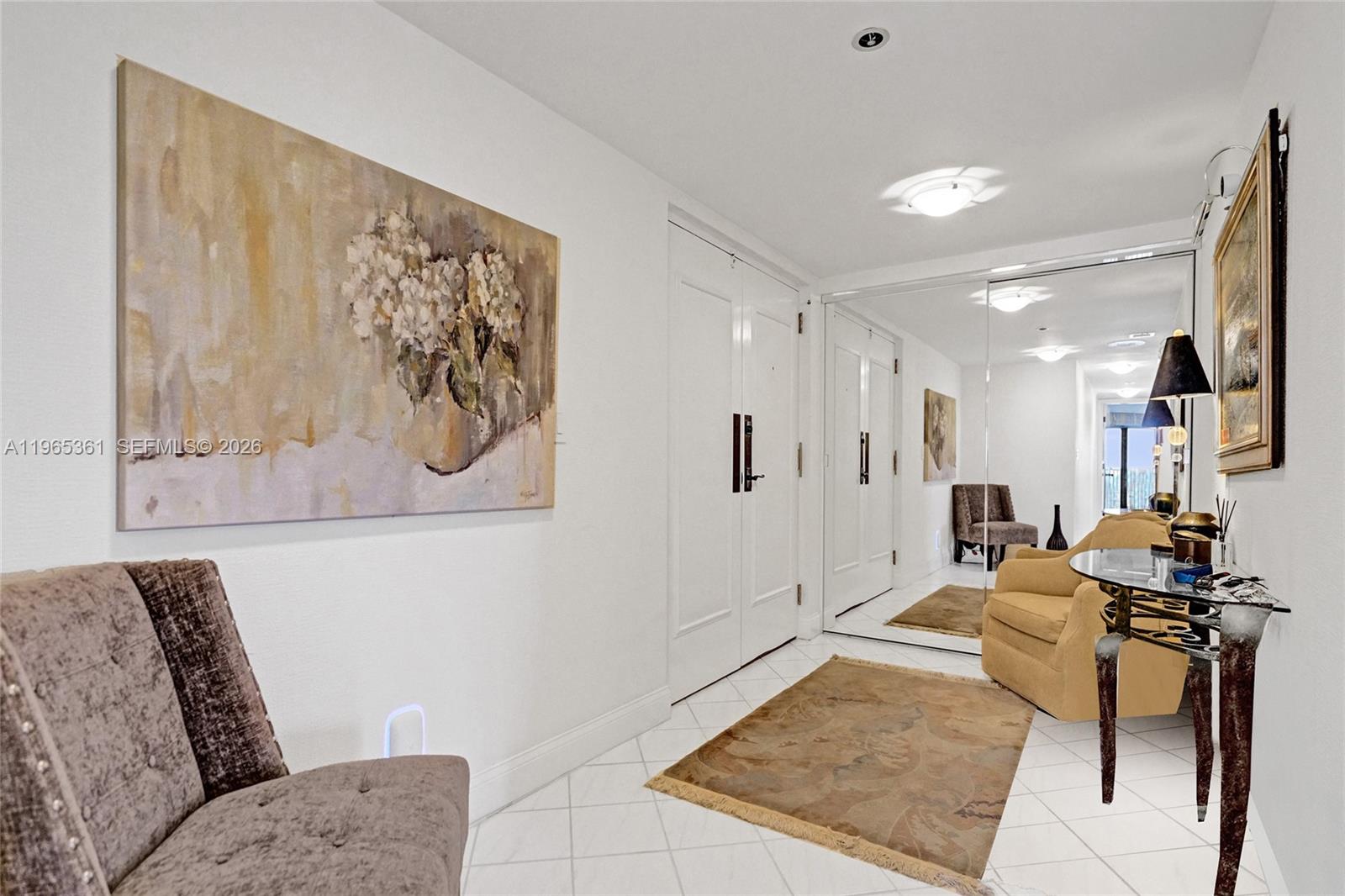 501 North Riverside Drive, Unit 802 Pompano Beach, FL 33062 - Photo 46 of 70 a living room with furniture and a rug