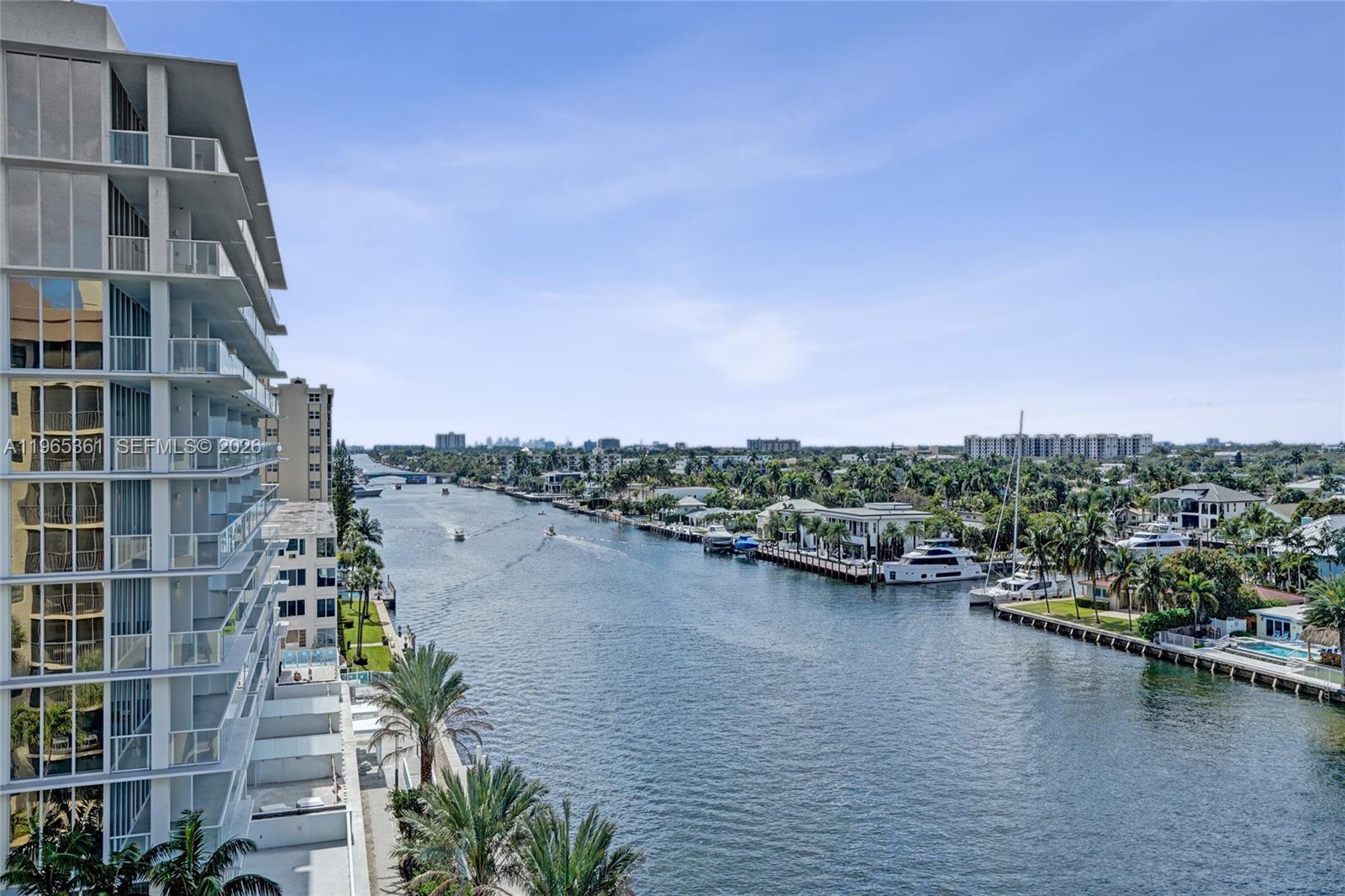 501 North Riverside Drive, Unit 802 Pompano Beach, FL 33062 - Photo 5 of 70 a view of a lake with tall building