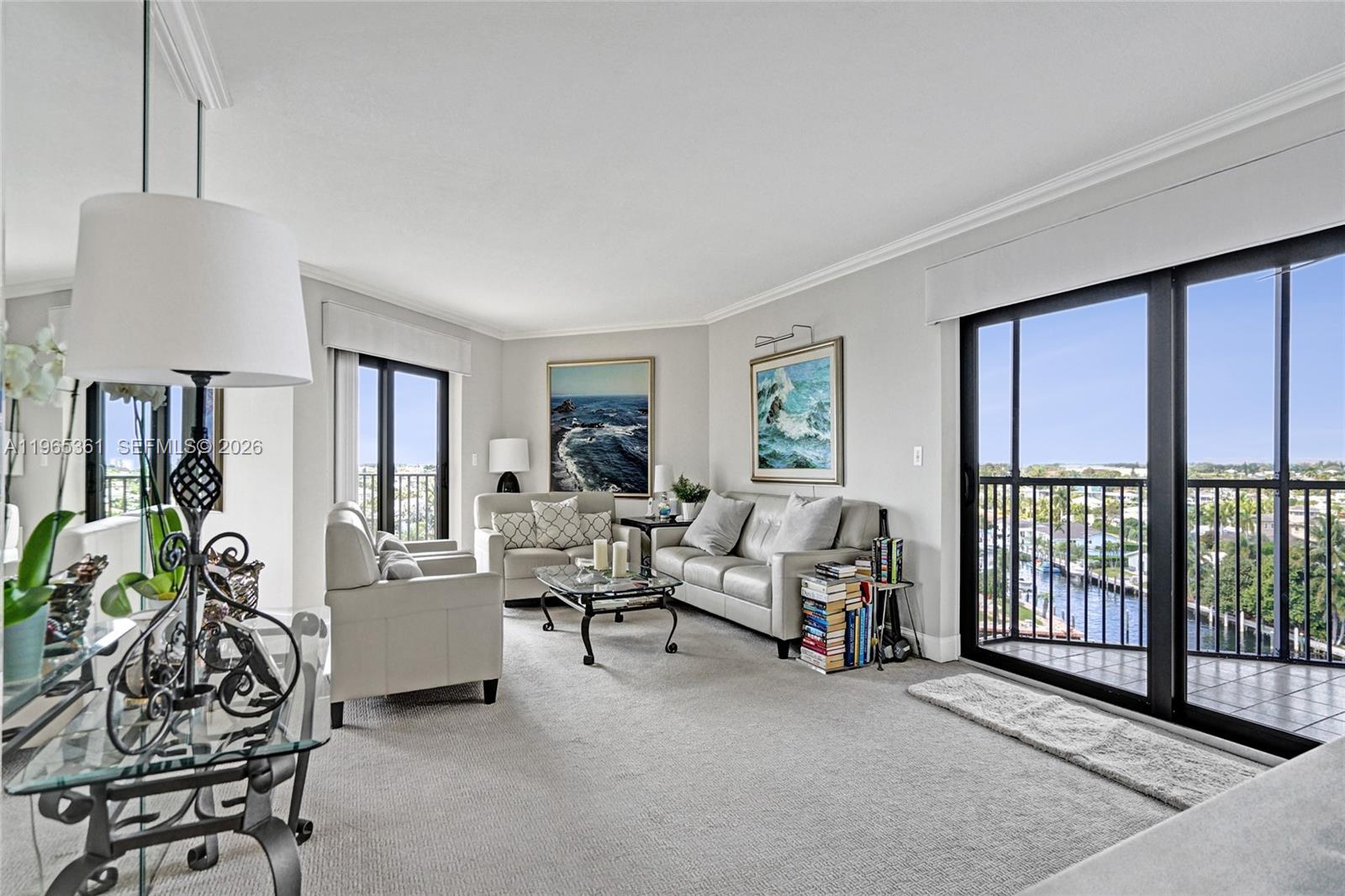 501 North Riverside Drive, Unit 802 Pompano Beach, FL 33062 - Photo 7 of 70 a living room with furniture and a window