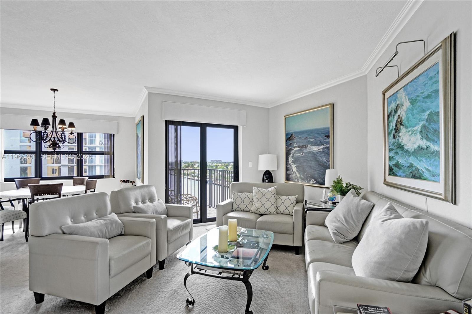 501 North Riverside Drive, Unit 802 Pompano Beach, FL 33062 - Photo 8 of 70 a living room with furniture and a large window