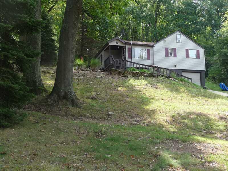 80 Simon Road Cheswick, PA 15024 - Photo 2 of 23 Exterior Front. View of the house from side of yard