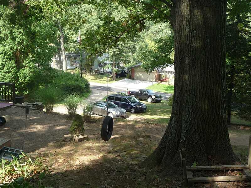 80 Simon Road Cheswick, PA 15024 - Photo 11 of 23 View. View from side yard looking down... towards Simon Road... lots of shade and privacy