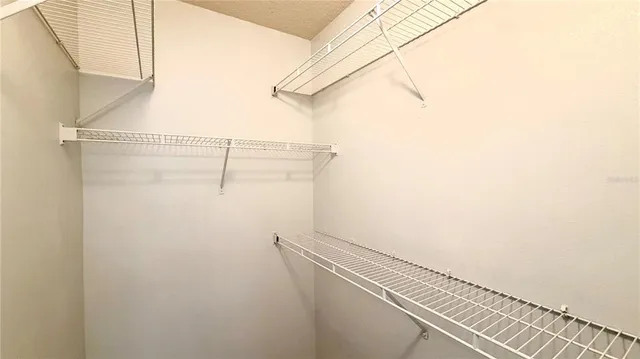 a view of a room with racks on the wall
