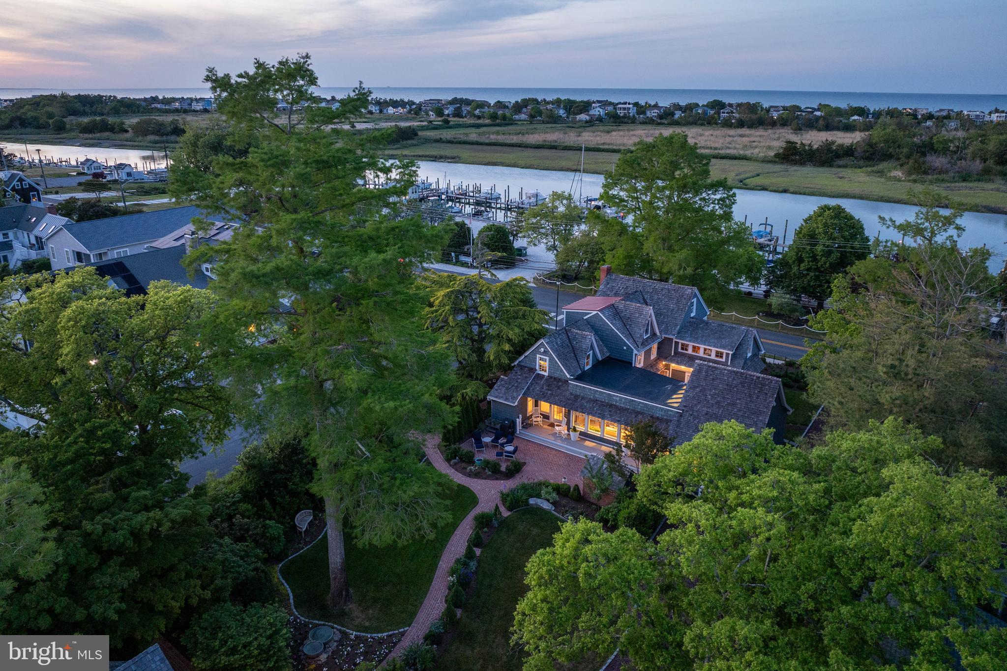 410 Pilottown Road Lewes, DE 19958 - Photo 5 of 114 an aerial view of a house with outdoor space and lake view