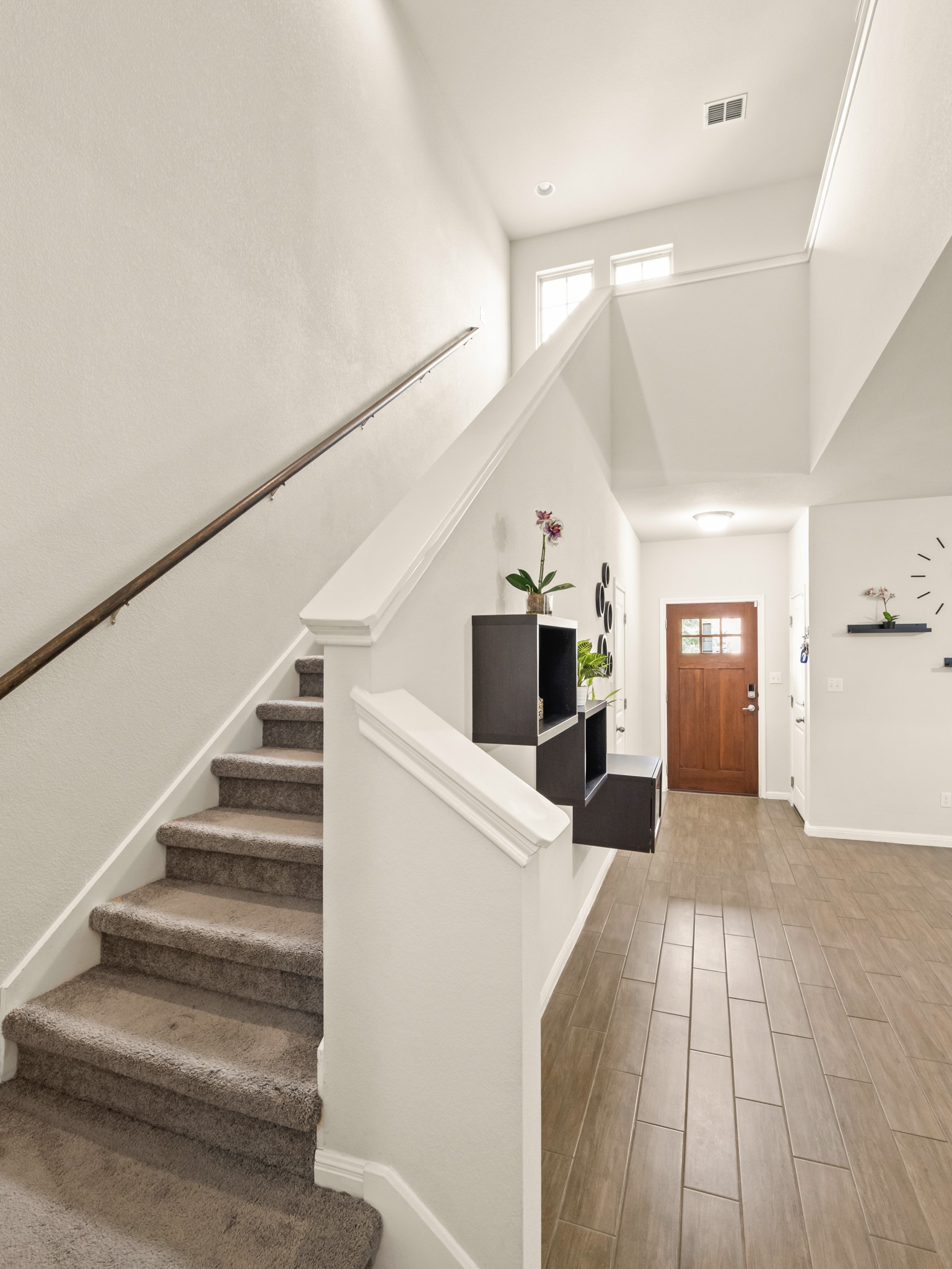 574 Nautical Loop Kyle, TX 78640 - Photo 8 of 23 Enter into a bright, inviting entryway featuring high ceilings and elegant flooring.