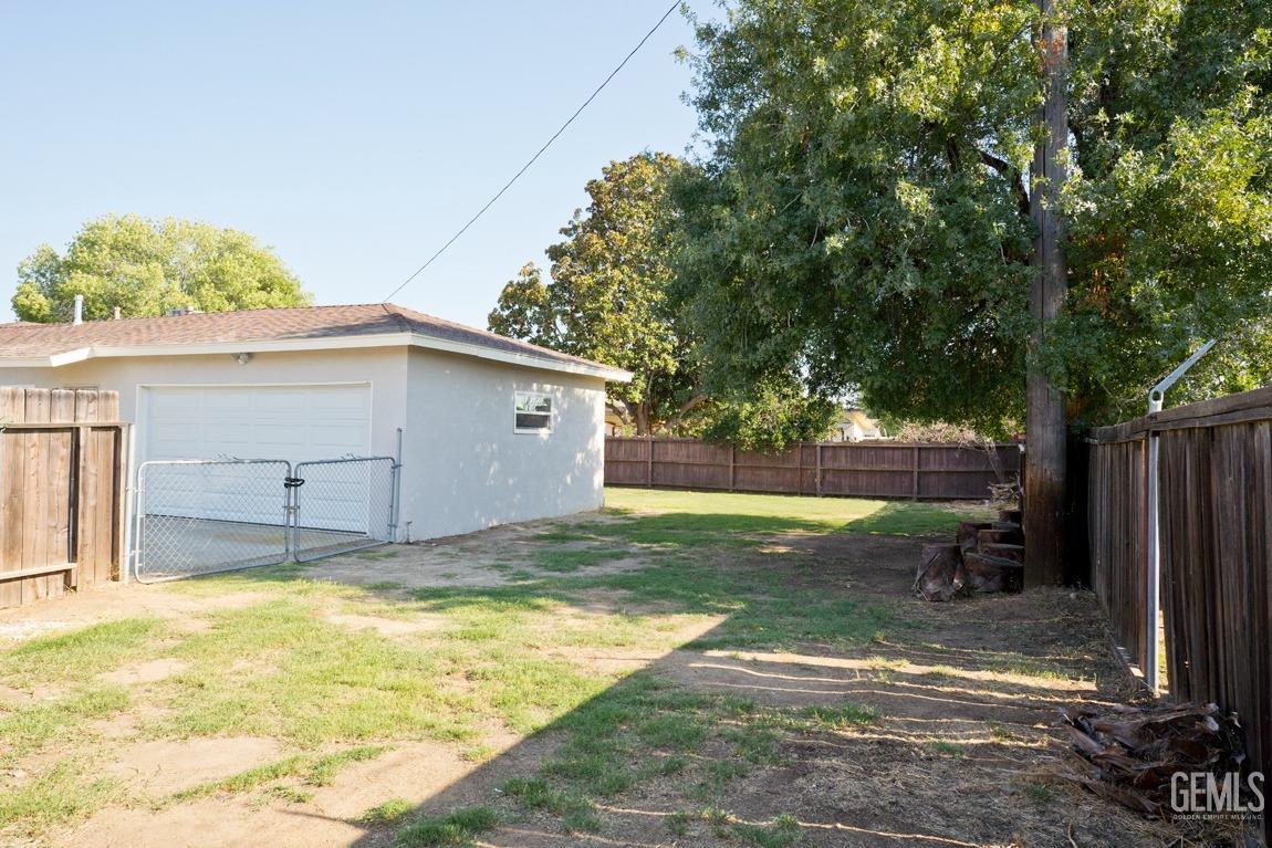 Undisclosed Address Bakersfield, CA 93308 - Photo 21 of 23 a view of a backyard of the house