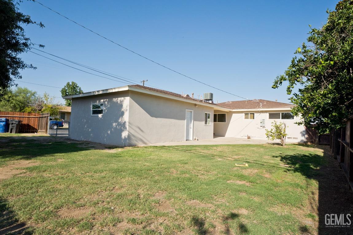 Undisclosed Address Bakersfield, CA 93308 - Photo 22 of 23 a house that has a big yard