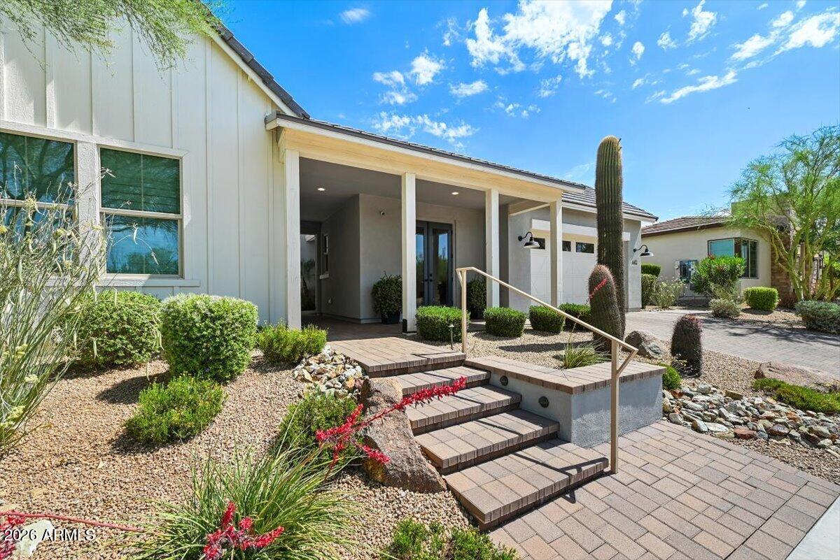 4412 East Roy Rogers Road Cave Creek, AZ 85331 - Photo 4 of 40 a front view of a house with patio