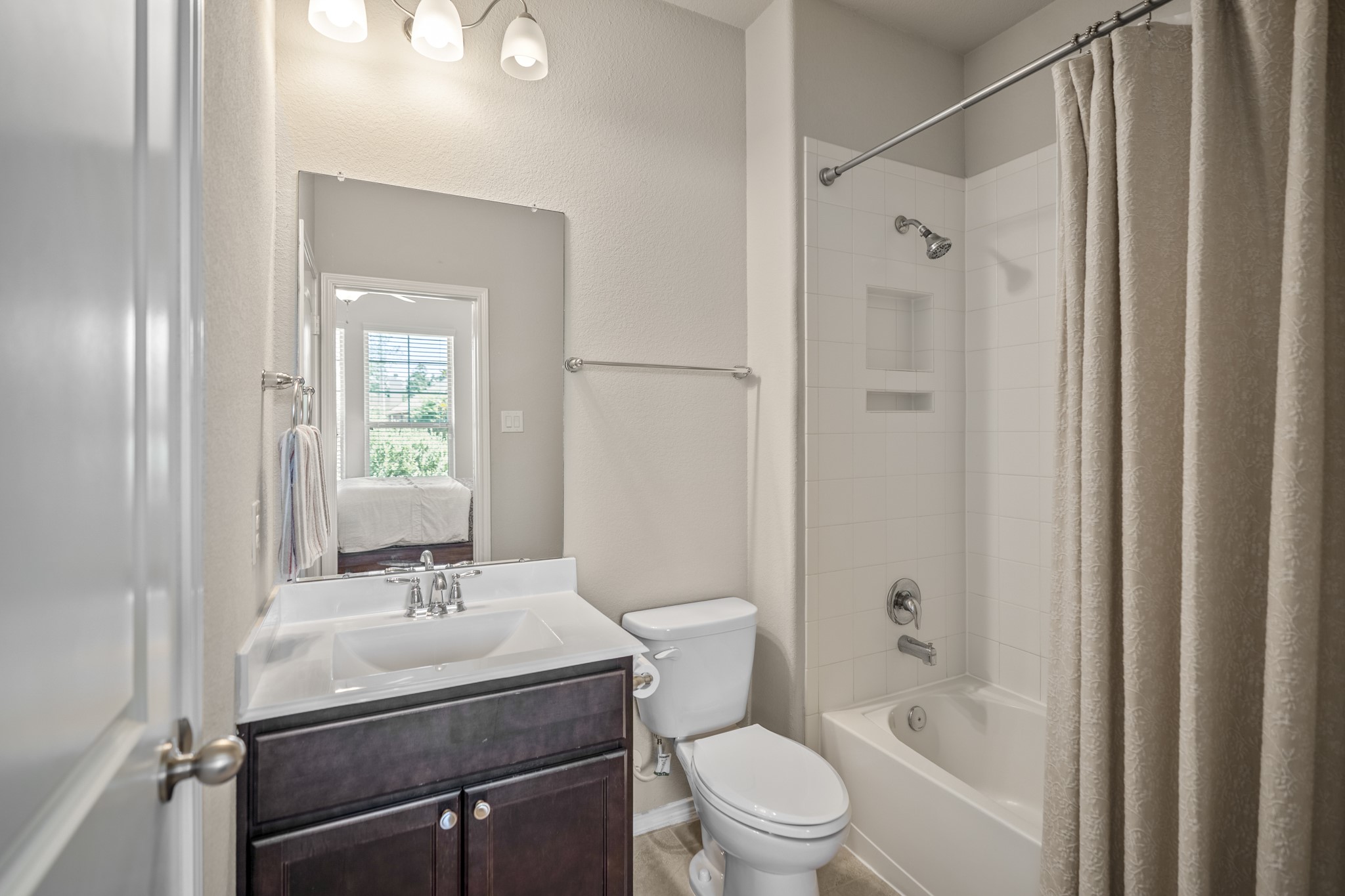 5522 Glenfield Spring Lane Spring, TX 77389 - Photo 23 of 46 Ensuite bathroom connected to the front bedroom.