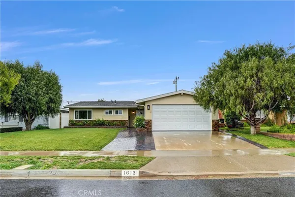 front view of house with a yard