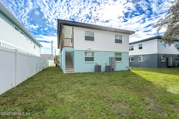 a house view with a backyard space