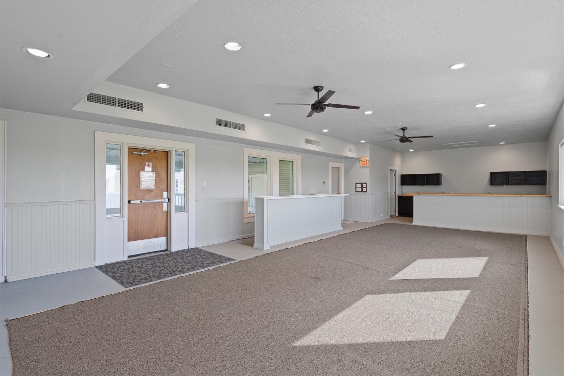 1102 Beech Street Taylor, TX 76574 - Photo 15 of 40 a view of a kitchen with a sink and a refrigerator