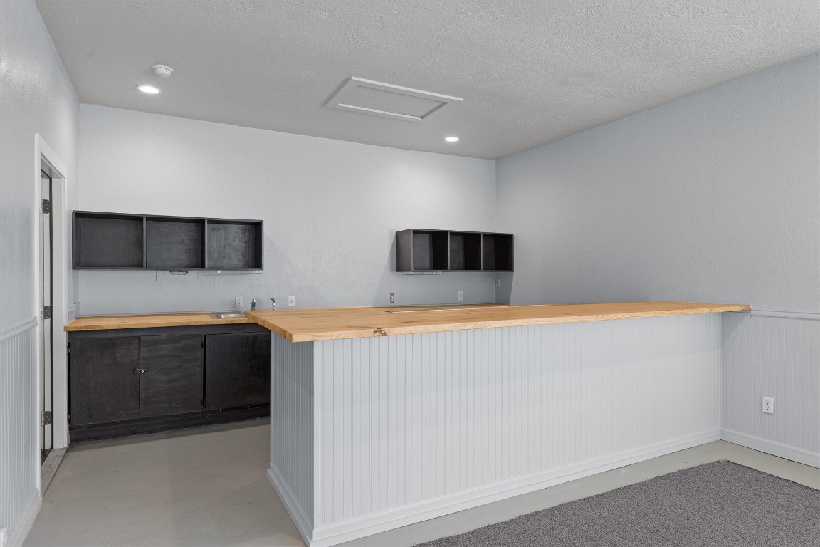 1102 Beech Street Taylor, TX 76574 - Photo 18 of 40 a living room with stainless steel appliances cabinets