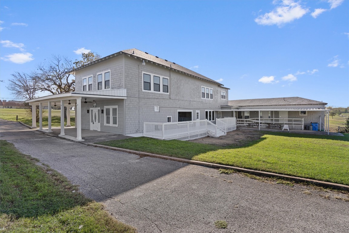 1102 Beech Street Taylor, TX 76574 - Photo 2 of 40 a view of an house with backyard and garden