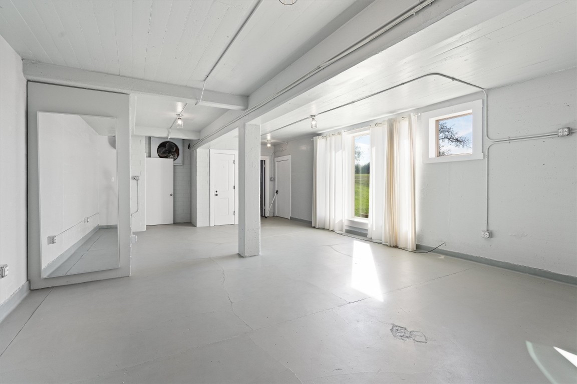 1102 Beech Street Taylor, TX 76574 - Photo 27 of 40 a view of a big room with an empty space