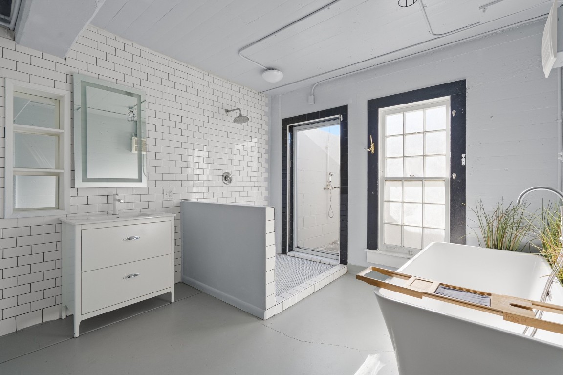 1102 Beech Street Taylor, TX 76574 - Photo 28 of 40 a room with a dresser and a window