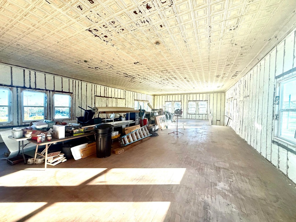 1102 Beech Street Taylor, TX 76574 - Photo 32 of 40 a living room with lots of furniture and a large window