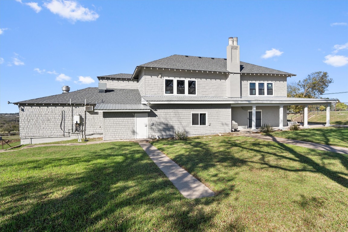1102 Beech Street Taylor, TX 76574 - Photo 39 of 40 a front view of a house with a yard
