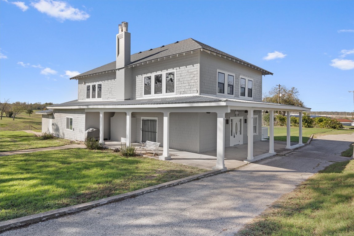 1102 Beech Street Taylor, TX 76574 - Photo 40 of 40 a front view of a house with a yard