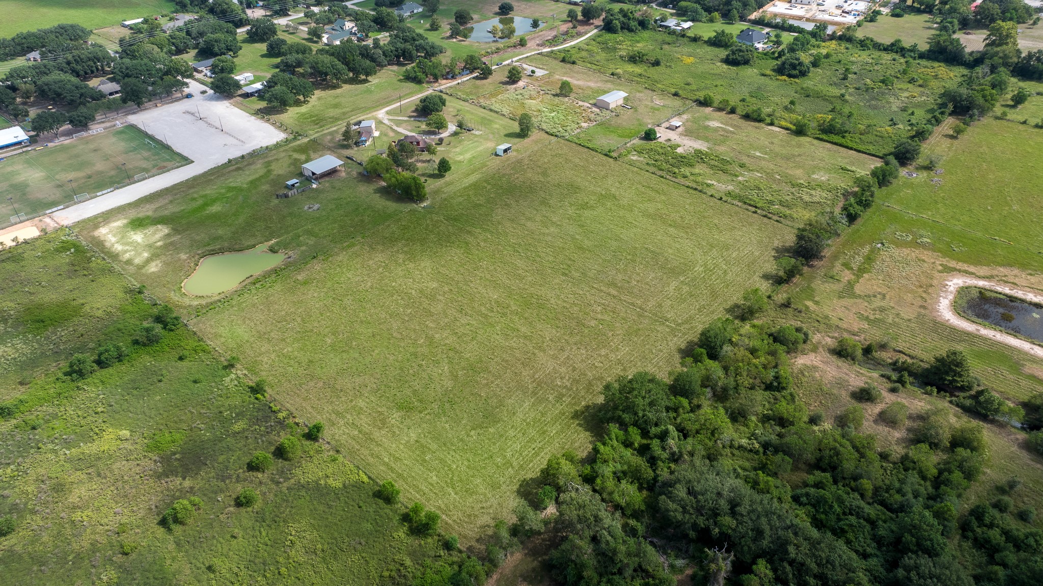 19105 Mueschke Road Tomball, TX 77377 - Photo 4 of 42 Expansive acreage offering flexibility for a variety of commercial or private-use possibilities.