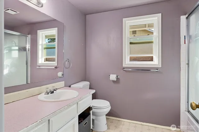 a bathroom with a sink and a toilet