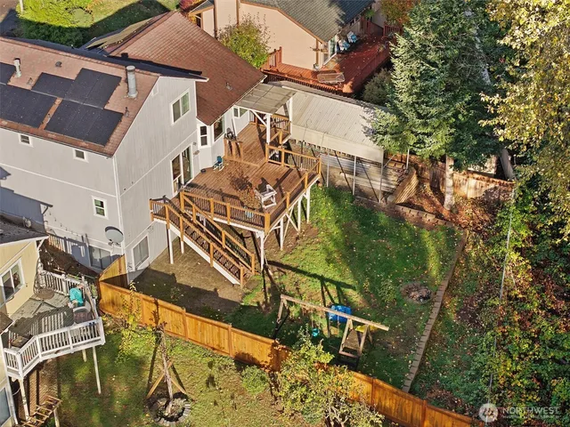 an aerial view of a house with swimming pool