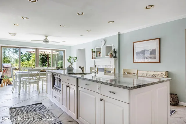 a kitchen with a stove and cabinets